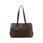 Brown Louis Vuitton Chelsea Damier Ebene shoulder bag with long dark leather straps, buckle details and gold-tone hardware.