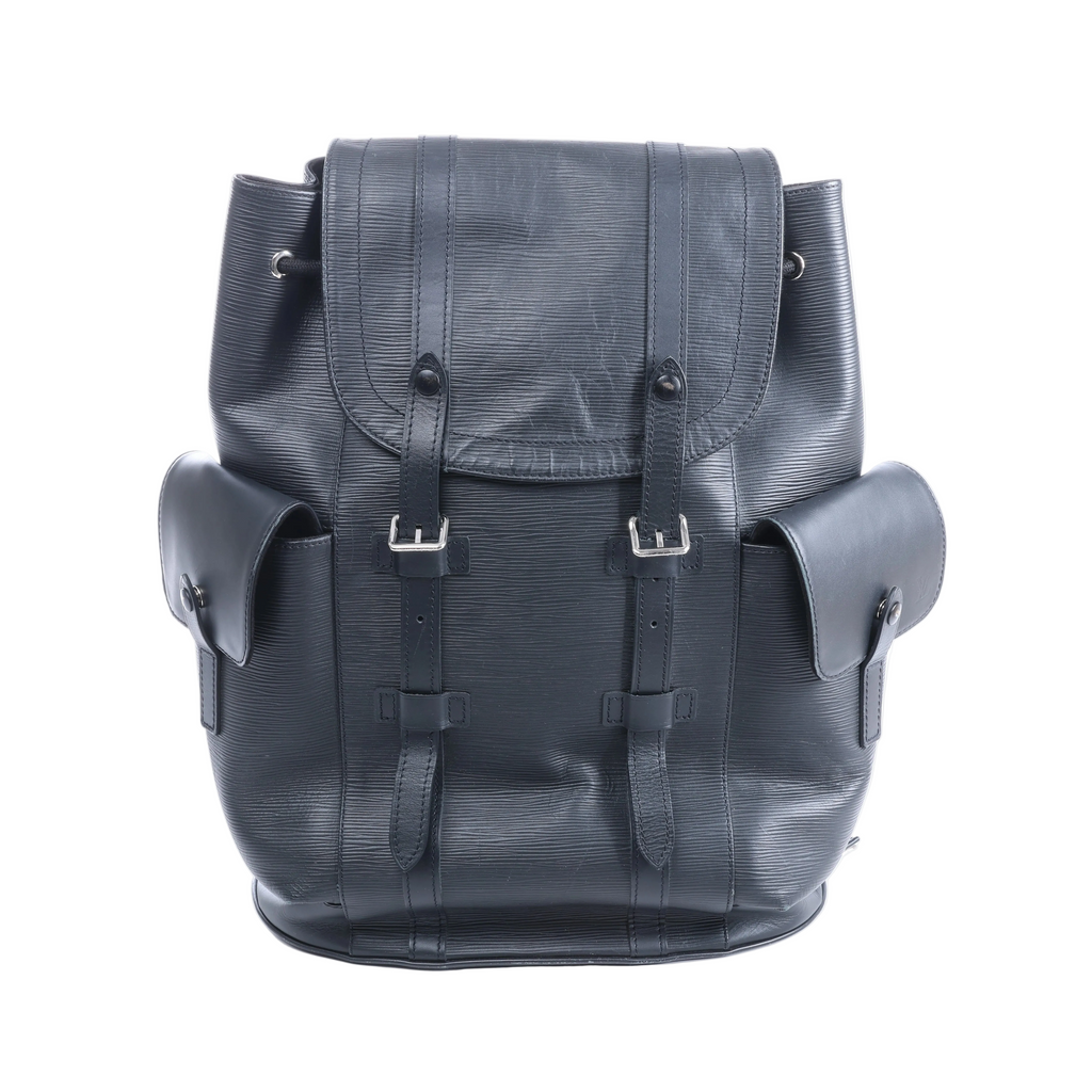 Black Louis Vuitton Christopher PM Epi leather backpack with textured body, flap top, dual buckle straps and side pockets on a white background.