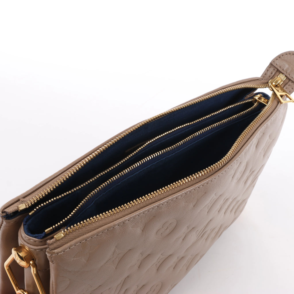 Louis Vuitton Coussin PM Monogram Embossed Shoulder Bag in Beige M21263