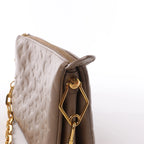Louis Vuitton Coussin PM Monogram Embossed Shoulder Bag in Beige M21263