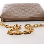 Louis Vuitton Coussin PM Monogram Embossed Shoulder Bag in Beige M21263