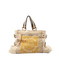 Louis Vuitton Toile Globe GM limited edition beige canvas tote with striped fabric top handles, front zip pocket, side strap details, and a large yellow “Louis Vuitton Trunks & Bags” world-city graphic, shown on a white background.
