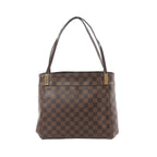 Louis Vuitton Marylebone PM brown Damier Ebene checkerboard shoulder bag with slim dark leather straps and gold-tone hardware on white background.
