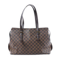 Louis Vuitton Chelsea brown Damier Ebene shoulder bag with dark brown leather straps, buckle details and structured tote shape.