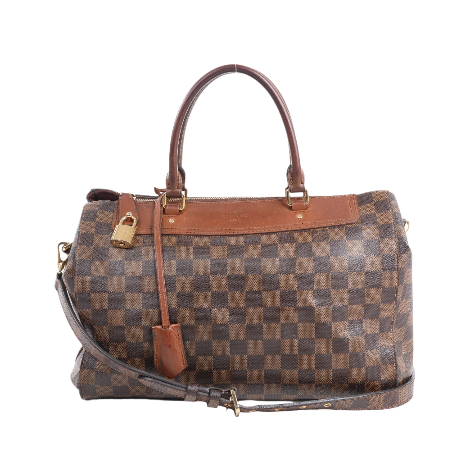 Brown checkered handbag with gold lock on a white background