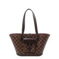 Brown Louis Vuitton Manosque PM Damier Ebene shoulder bag with long dark leather straps, a flared shape and a buckled front flap pocket.