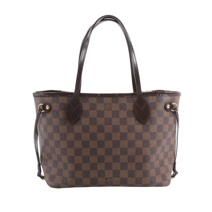 Brown checkered handbag with gold hardware on a white background