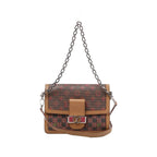 Front view of Louis Vuitton Dauphine MM LV Pop bag with multicoloured Monogram, brown leather trim, silver-tone LV clasp, chain and leather straps.