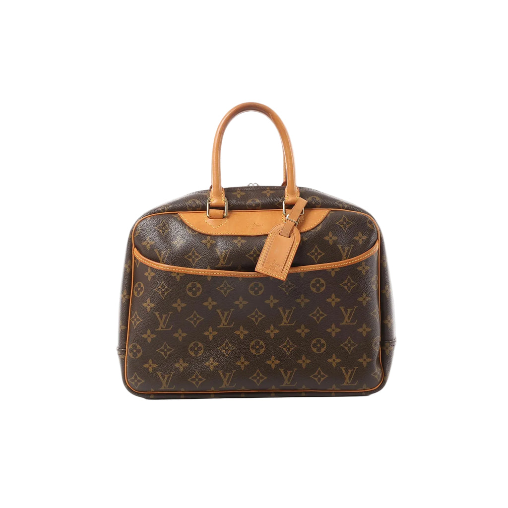 Louis Vuitton Deauville handbag in brown Monogram canvas with tan vachetta leather top handles and trim, gold-tone hardware, and hanging leather tag on a white background.