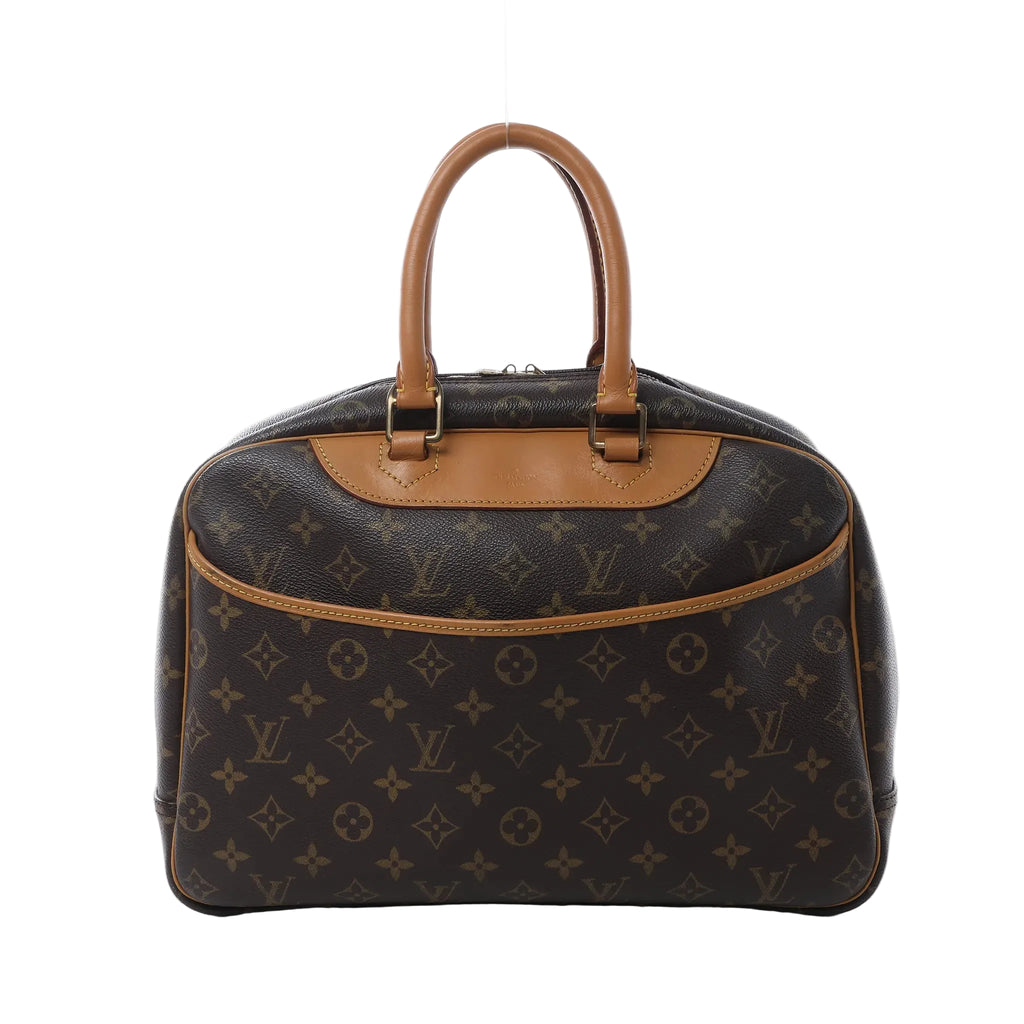 Louis Vuitton Deauville handbag in brown Monogram canvas with tan vachetta leather handles, front slip pocket, zip-top closure, and gold-tone hardware on white background.