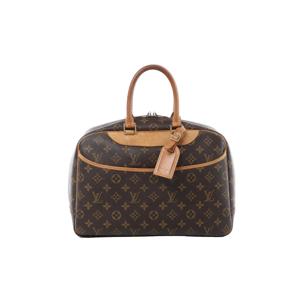 Louis Vuitton Deauville handbag in brown Monogram canvas with tan leather trim, rolled top handles, luggage tag and front pocket.