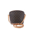 Louis Vuitton Drouot crossbody bag in brown Monogram canvas with tan vachetta leather trim, zip-top closure and adjustable strap on white background.