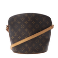 Louis Vuitton Drouot crossbody bag in brown Monogram canvas with a tan leather strap, curved structured shape and gold-tone hardware.