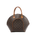 Louis Vuitton Ellipse MM handbag in brown Monogram coated canvas with natural cowhide leather rolled handles, curved structured shape, and gold-tone hardware on a white background.