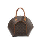Louis Vuitton Ellipse MM handbag in brown Monogram coated canvas with natural cowhide leather rolled handles, curved structured shape, and gold-tone hardware on a white background.