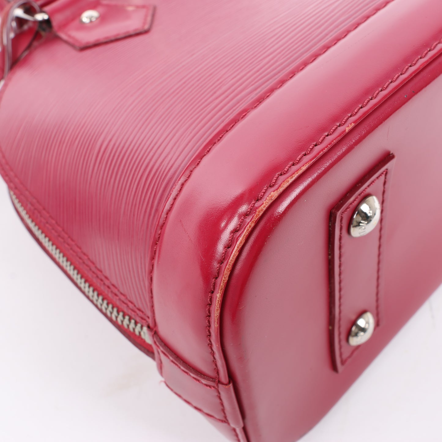 Sac à main Louis Vuitton Alma BB en cuir épi framboise M40851