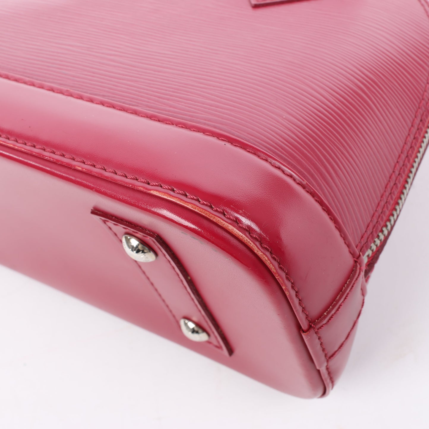 Louis Vuitton Epi Leather Alma BB Handbag in Raspberry M40851