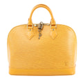 Yellow handbag with a lock on a white background