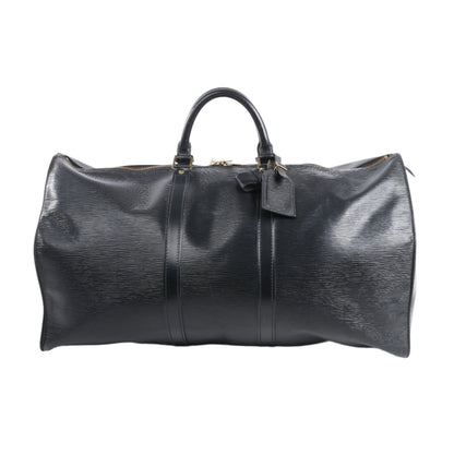 Black leather duffel bag on a white background