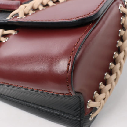 Sac bandoulière Louis Vuitton Twist MM en cuir Epi noir M42449