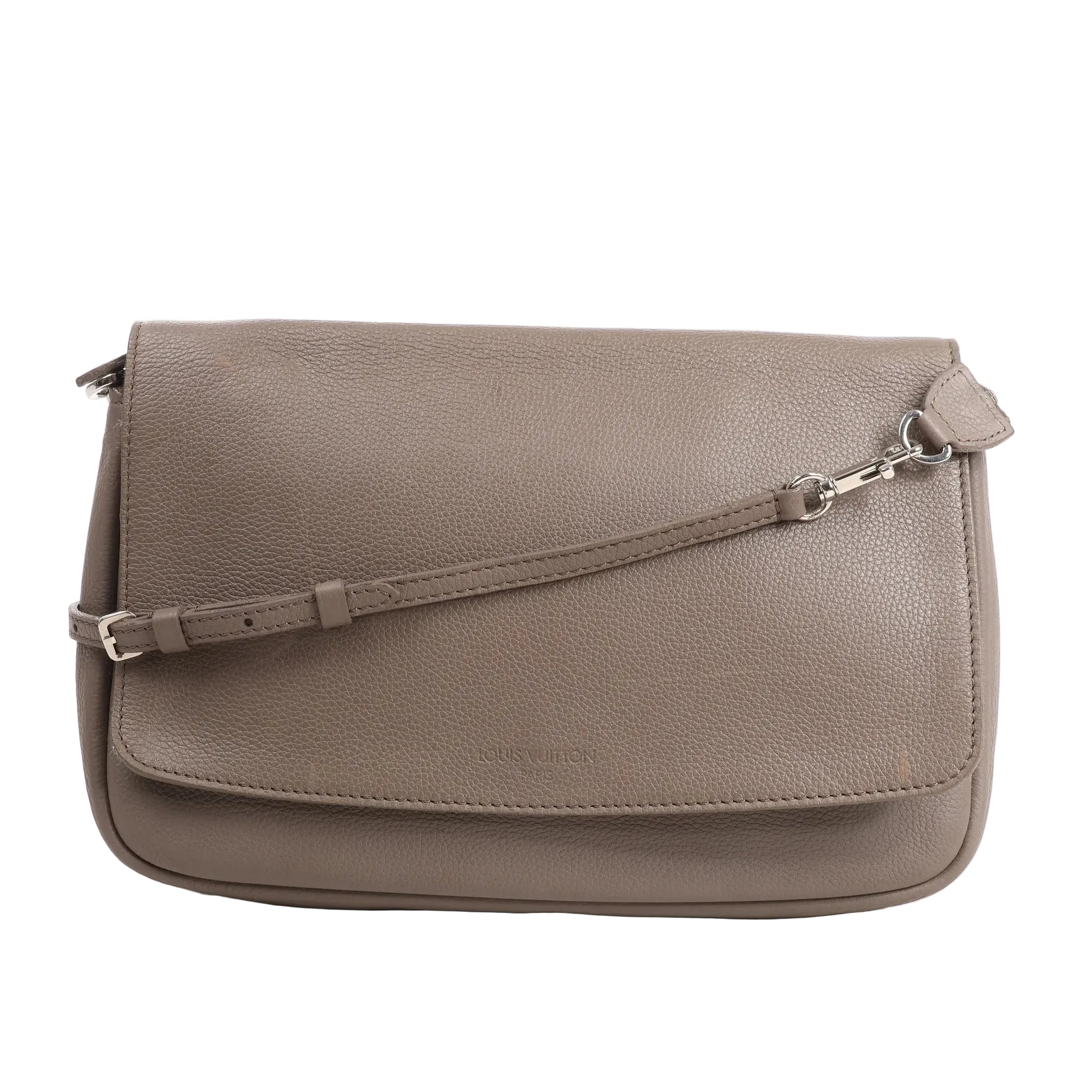 Louis Vuitton Essentiel Crossbody Bag M94446 in gray Taurillon Clemence leather featuring a flap closure, adjustable leather strap, and subtle Louis Vuitton embossing on the front of its soft, pebbled surface.