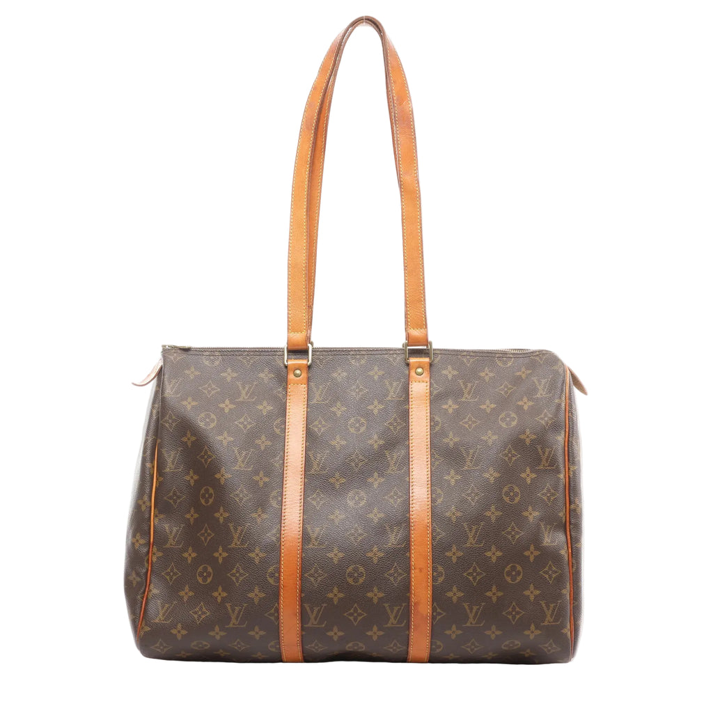Louis Vuitton Flanerie 45 shoulder bag in brown Monogram coated canvas with natural cowhide leather straps and trim, gold-tone hardware, and zip top closure on a white background.