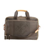 Louis Vuitton Associe GM 2Way handbag in Khaki Damier Geant canvas featuring top handles, adjustable shoulder strap, beige leather accents, and large embossed “LOUIS VUITTON PARIS” branding on the front.