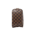 Louis Vuitton Geronimos crossbody bag in brown Damier Ebene canvas with structured rectangular shape, zip-around closure, and dark brown leather trim on a light gray background.