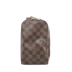 Brown Louis Vuitton Geronimos Damier Ebene bag with a checkerboard pattern, rounded rectangular shape, dark leather piping and two gold-tone zip pulls.