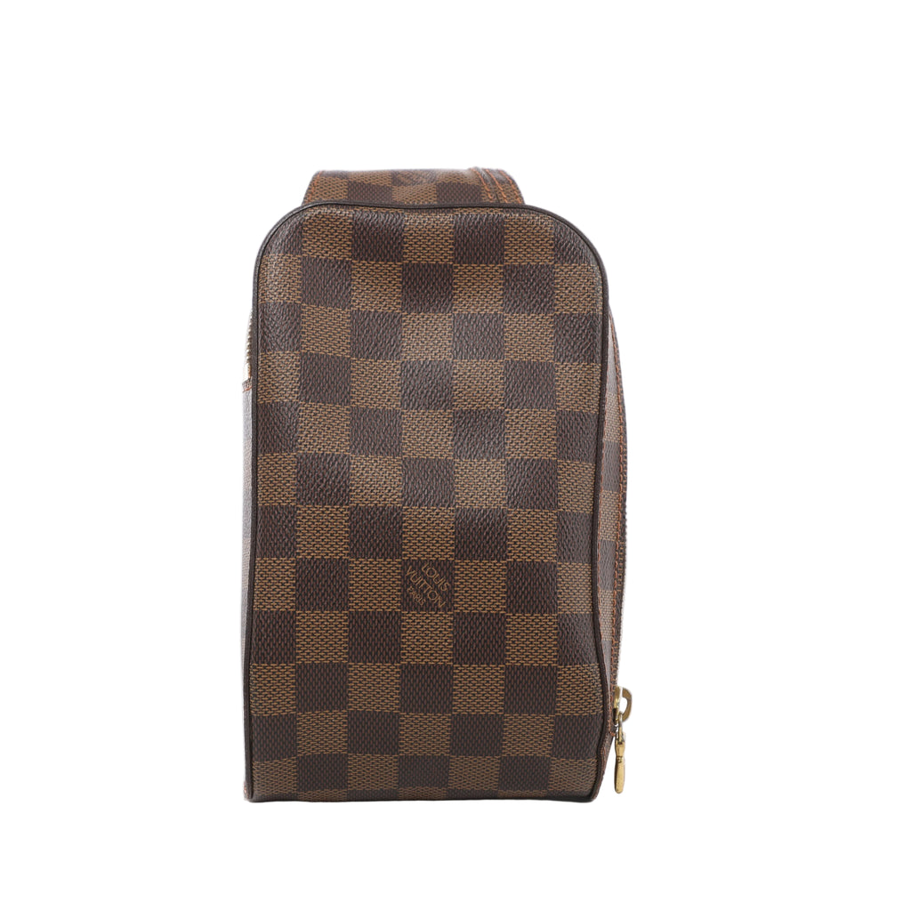 Louis Vuitton Geronimos bag in brown Damier Ebene checkerboard canvas with rounded corners, dark leather piping and gold-tone zip pulls.