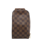 Louis Vuitton Geronimos bag in brown Damier Ebene checkerboard canvas with rounded corners, dark leather piping and gold-tone zip pulls.