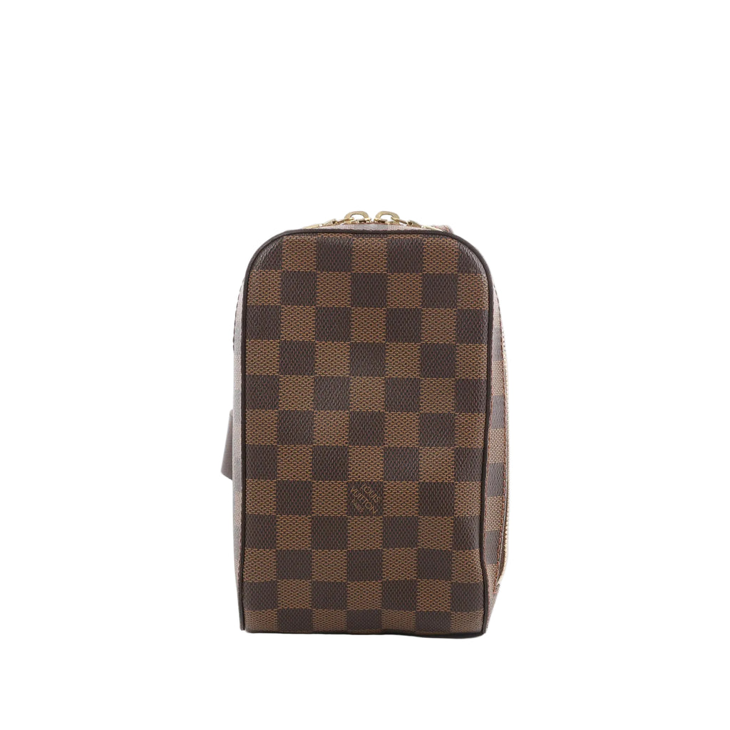Front view of Louis Vuitton Geronimos bag in brown Damier Ebene canvas with zip-top closure and adjustable strap visible behind.