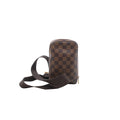 Louis Vuitton Geronimos crossbody bag in brown Damier Ebene canvas with a vertical shape, zip-around closure and wide brown textile strap.