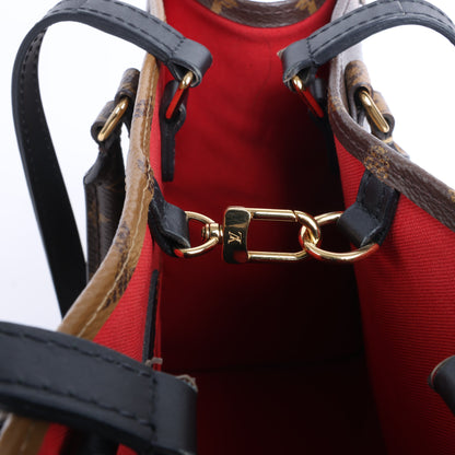 Louis Vuitton Giant Monogram Reverse On the Go MM en marron M45321