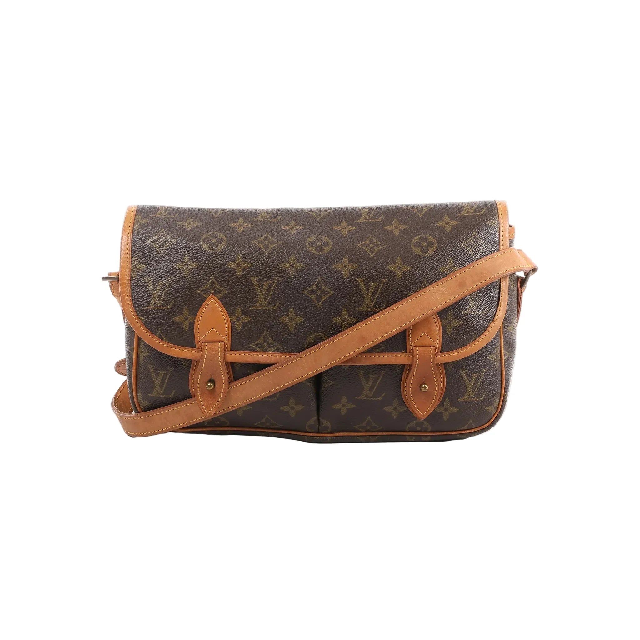 Louis Vuitton Gibecière MM crossbody bag in brown Monogram canvas with tan leather trim, flap front, and long shoulder strap on white background