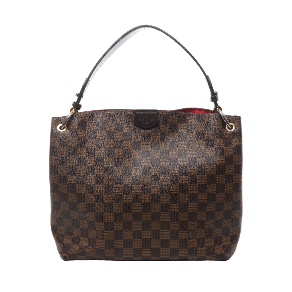 Brown Louis Vuitton Graceful PM Damier Ebene shoulder bag with dark leather strap, gold-tone eyelets and a glimpse of red lining.