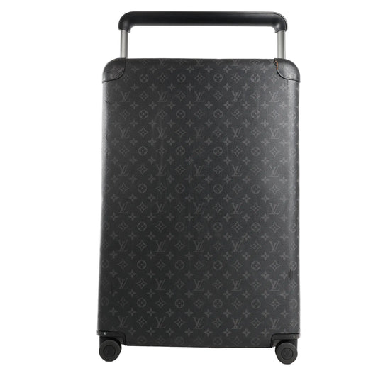Front view of a Louis Vuitton Horizon 60 travel bag in black Monogram Eclipse canvas, featuring a hard-shell design, four wheels, and a telescopic handle.