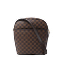 Louis Vuitton Ipanema GM crossbody bag in brown Damier Ebene canvas with dark leather trim, curved top and adjustable shoulder strap.