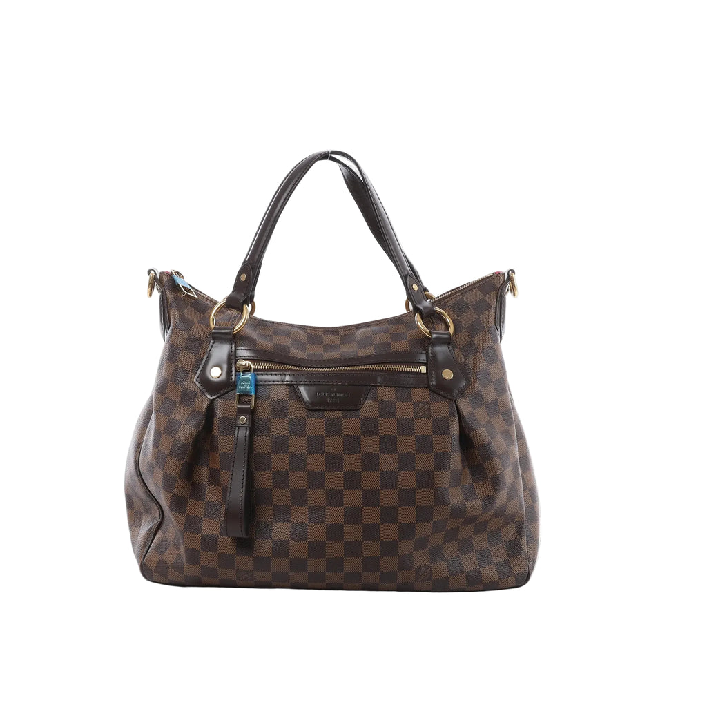 Louis Vuitton Ivorie MM shoulder bag in brown Damier Ebene canvas with dark leather handles, gold-tone hardware and front zip pocket.
