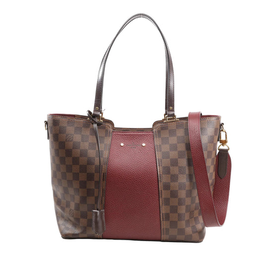 Front view of a Louis Vuitton Jersey 2-Way Shoulder Bag featuring Damier Ebene coated canvas sides, a central burgundy pebbled leather panel, dual dark brown leather handles, a removable shoulder strap, and gold-tone hardware.