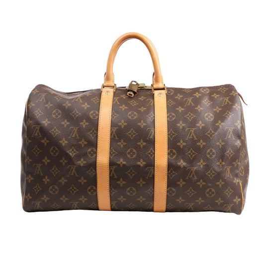 Louis Vuitton Monogram Canvas Keepall 45 Travel Bag M41428 featuring brown LV monogram canvas, tan leather handles and trim, gold-tone hardware, and zip closure with padlock, displayed on a white background.