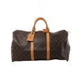 Brown Louis Vuitton Keepall 50 Monogram canvas travel bag with tan leather top handles, vertical trim, luggage tag and gold-tone zip hardware.
