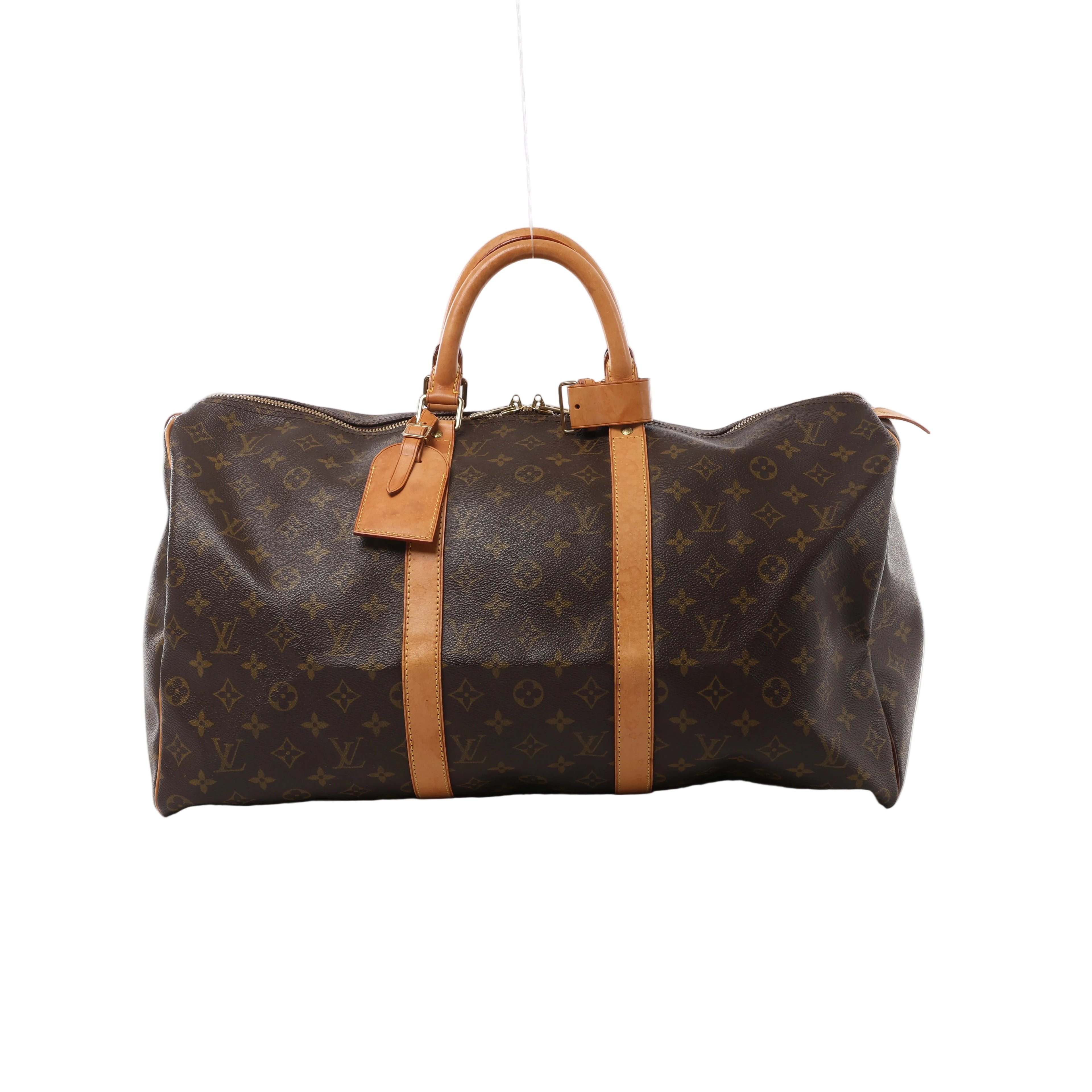 Brown Louis Vuitton Keepall 50 Monogram canvas travel bag with tan leather top handles, vertical trim, luggage tag and gold-tone zip hardware.