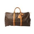 Louis Vuitton Keepall 50 travel bag in brown Monogram canvas with vachetta leather trim, zip-top closure, rolled top handles, and hanging leather tag on white background.