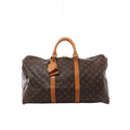 Louis Vuitton Keepall 50 Monogram canvas travel bag with tan leather top handles, vertical trim, luggage tag and gold-tone zip hardware.
