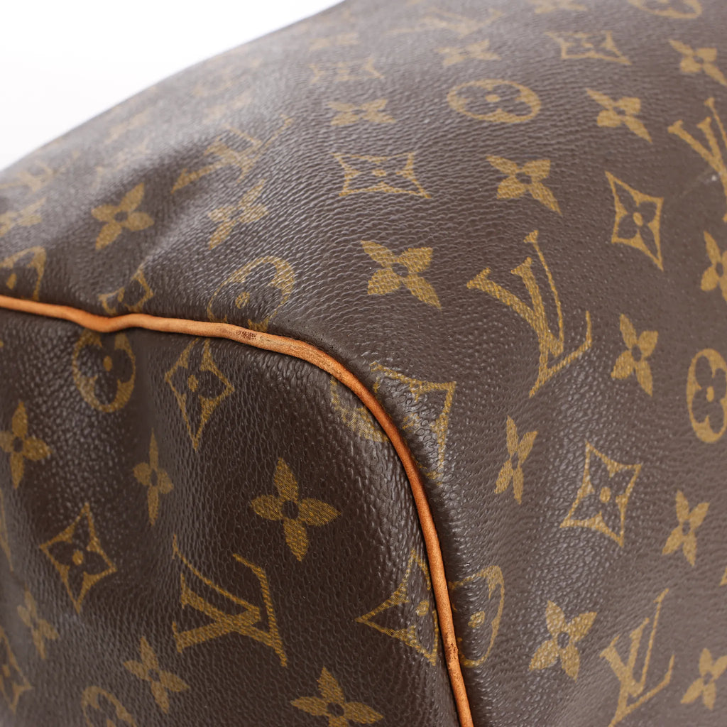 Louis Vuitton Keepall 55 Monogram Canvas Travel Bag in Brown M41424