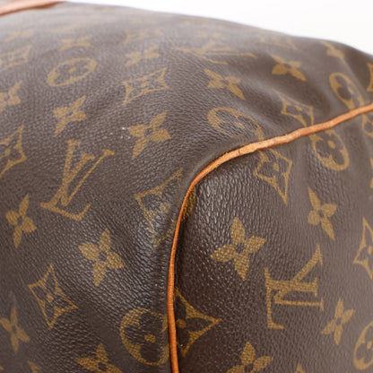Louis Vuitton Keepall 55 Monogram Canvas Travel Bag in Brown