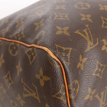 Louis Vuitton Keepall 55 Monogram Canvas Travel Bag in Brown