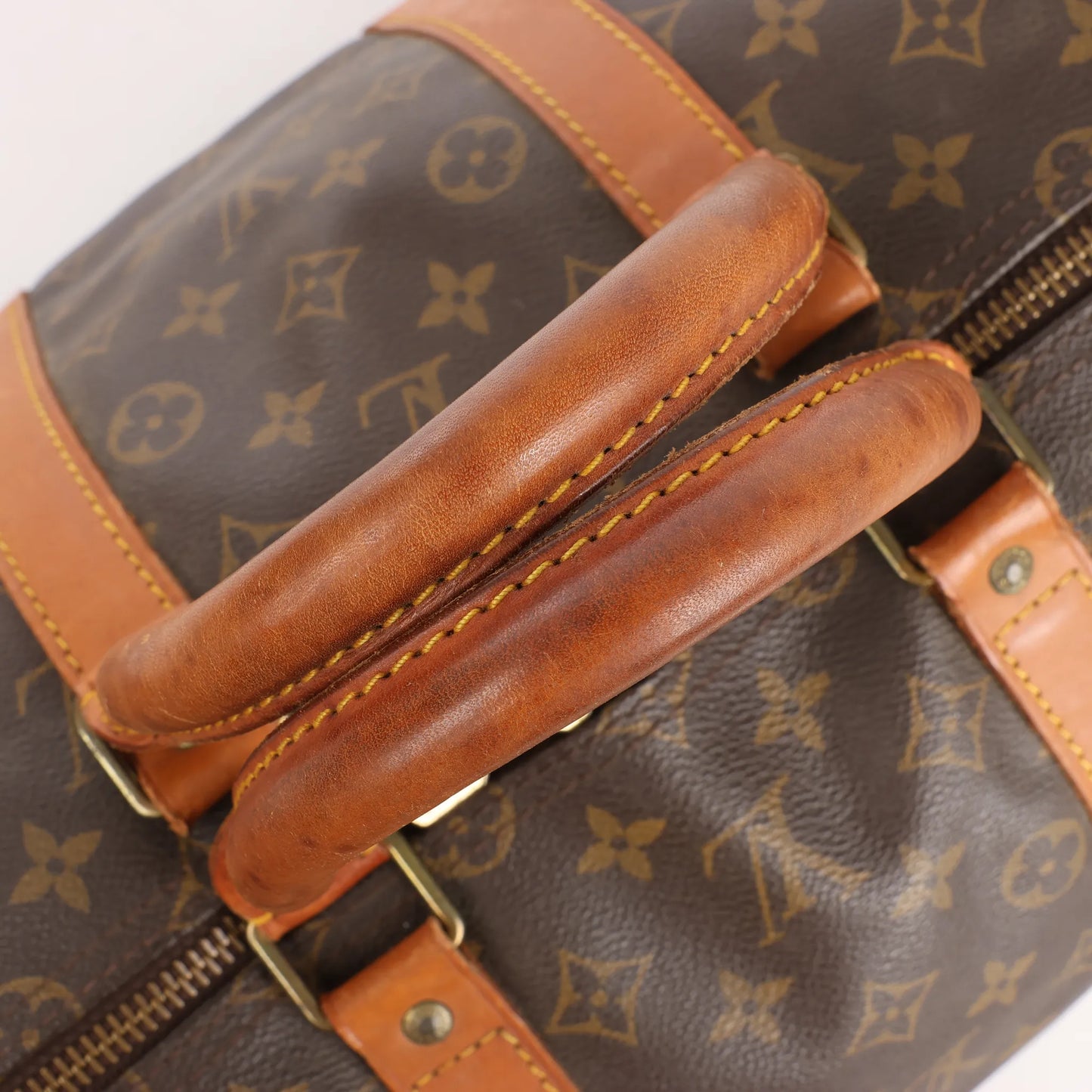Louis Vuitton Keepall 55 Monogram Canvas Travel Bag in Brown
