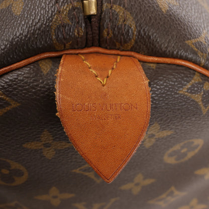 Louis Vuitton Keepall 55 Monogram Canvas Travel Bag in Brown